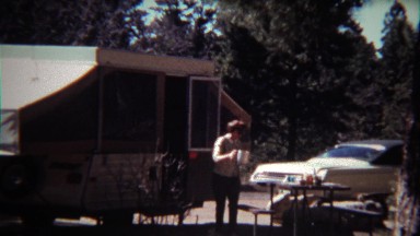 1972: Women coming out of wilderness camper to your morning coffee.