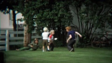 1973: Boys Roughhousing in Backyard Playing Make Believe with Guns