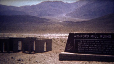 1972: Ashford Mill ruins abandoned in dry desert mountain landscape.