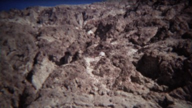 1972: High Water Mark of Ancient Sea Level Marker on Side of Mountain