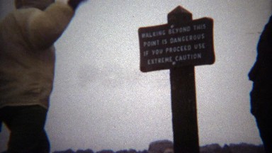 1971: Walking past this sign is extremely dangerous proceed with caution.