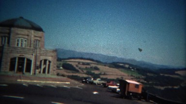 1971: Driving to the sacred religious temple building on sunny day.