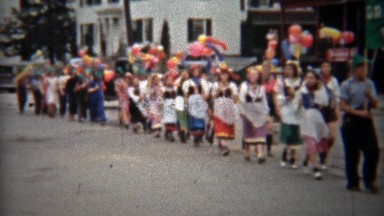 1945: Kids Balloon Parade Walking Through Downtown Main Street