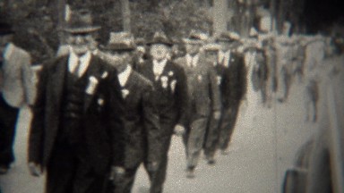 1939: World War I Veteran Parade Marching Through Small Town