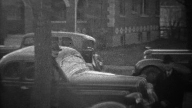1939: New Two-Door Coupe-Style Classic Car Driving Residential Street