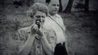 1939: Photographers pointing film cameras at cinematographer.
