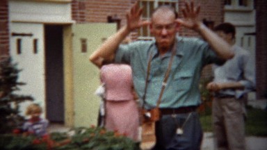 1940: Silly Photographer Man Making Funny Faces at Camera