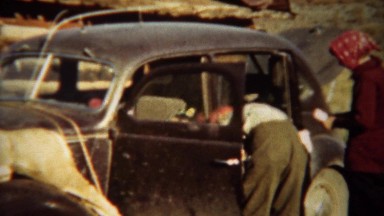 1939: Two Dead Whitetail Deer Tied to Lincoln Car Hood for Transport at Grand Lake, Colorado