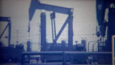 1956: Oil Rig Pump Jacks Sucking Black Gold Crude Underground.