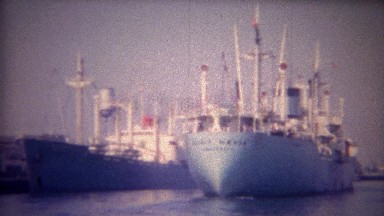 1956: Marit Maersk Danish container cargo ship empty into port.