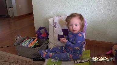 Baby Pulling Out Hair Clip From Head Of Long Brown Blonde Hair. Denver, Colorado
