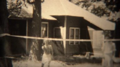 1936: People Throwing Floppy Frisbee Disc Over Badminton Net in Tryon, NC