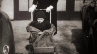 1941: Mother Pushing Baby Stroller in Winter, Tryon, North Carolina