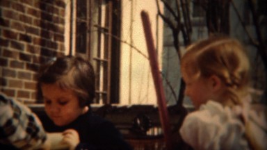 1937: Girl Rolling Dice in Cup Playing Game with Girlfriend Outdoor Summer