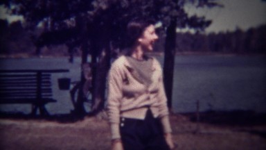 1937: Drunk women golfer dancing with golf club in hand mocking sport. TRYON, NC