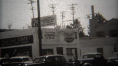 1946: 7up parking signs 25 cents check luggage guns in rear. SAN DIEGO,