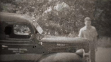 1947: Diamond crystal salt company worker exits car.