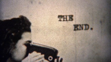 1962: The End leader shot women filming movie camera.