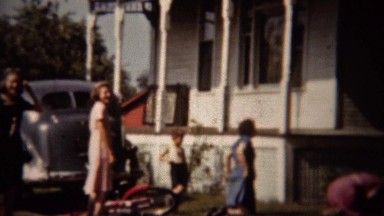 1962: Family playing leap frog game confused about rules.