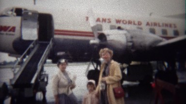 1949: Trans World Airlines propeller turbojet airplane boarding.
