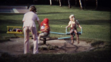 1974: Kids Ride Carousel With Raggedy Andy and Anne Dolls