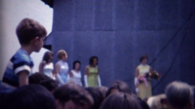 1962: Beauty Pageant Contest Winner with Trophy and Flower Bouquet