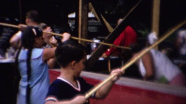 1962: Kids bamboo cane fishing county fair game prizes.