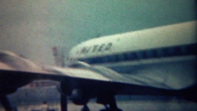 1961: United airplane propeller start burns blows smoke explosion.