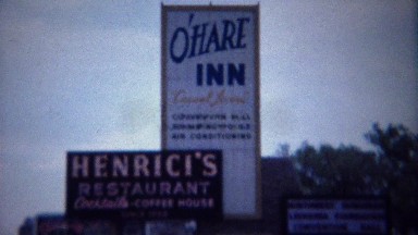 1962: O'hare Inn casual living Henrici's restaurant signs.