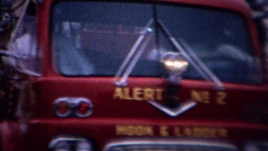 1961: Rural Country Parade with Red Fire Engine and Trucks