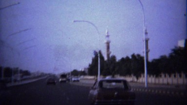 1974: Arab Style Religious Minarets Car Driving Near Highway