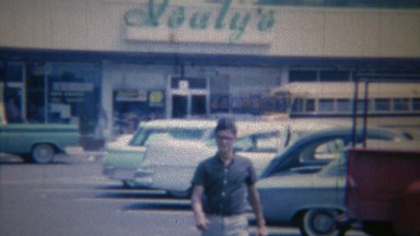 1963: Teenage Boy Leaving Supermarket Parking Lot in Akron, Ohio