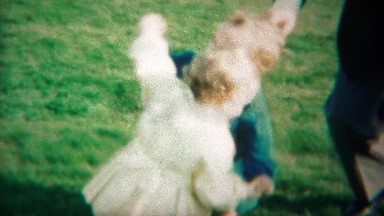 1964: Happy babies wrestling dancing outdoor park lose interest.