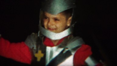 1964: Kid pretend sword fighting for school knights of round table play.