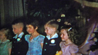 1965: Flower girl and ring bearer kids at wedding event.