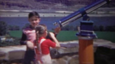 1954: Brother Lets Kid Sister Look Through Telescope at Rest Stop