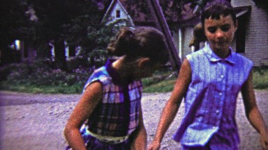 1959: Sisters rivalry colorful dress fighting fly swatter battery abuse.
