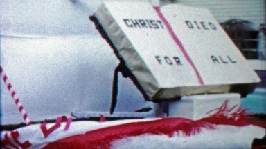 1959: Christ died for all bible church parade religious float.