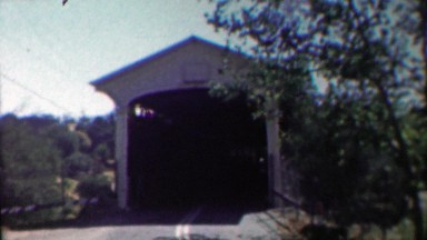 1958: Kraft cheese delivery truck coming out of bridge tunnel.