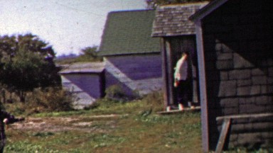 1958: Woman closes door runs rural summer sunny farmhouse.