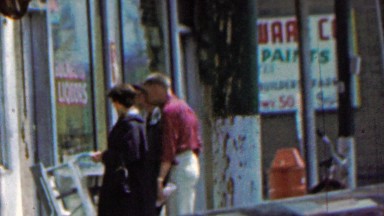 1961: Happy Family Window Shopping at Liquor Store in Canon City, Colorado