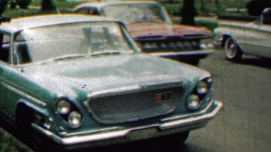1962: Classic Blue Car Parked in Residential Street, Lawrence, Kansas