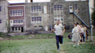 1958: Schoolyard Kids Practice Long Jump Athletic Sports Competition