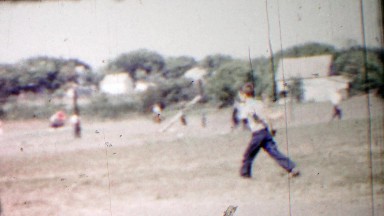 1958: Physically Challenged Child Practices Walking in Schoolyard Playground
