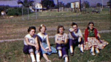1958: After school girl friends gang hanging out waiting for ride.