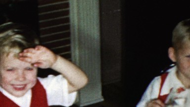 1963: Christmas season eating cake cute boys birthday party.