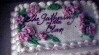 1964: The gathering of the clan cake decoration pink rose flowers.