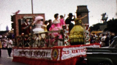 1960: Old Kentucky whiskey parade float old timey 1890s dress.
