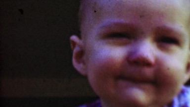1957: Cute Baby with Infectious Smile in Houston, Texas