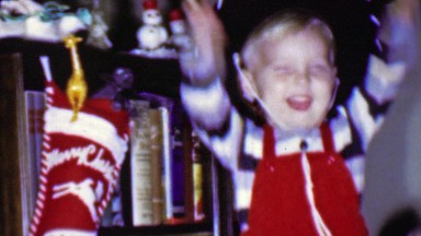 1957: Sugar induced hyper kid drum sticks cowboy hat Christmas morning.